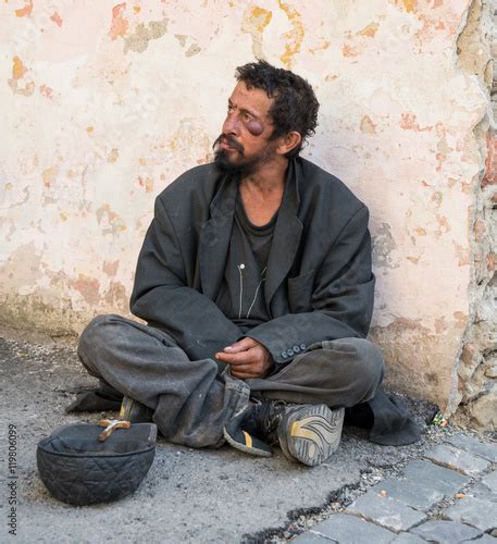 Homeless Dirty Man On The Street Of The City Stock Photo Adobe Stock