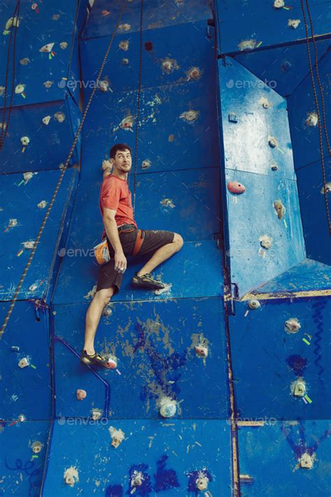 Fit Man Rock Climbing Stock Photo By Diignat Photodune