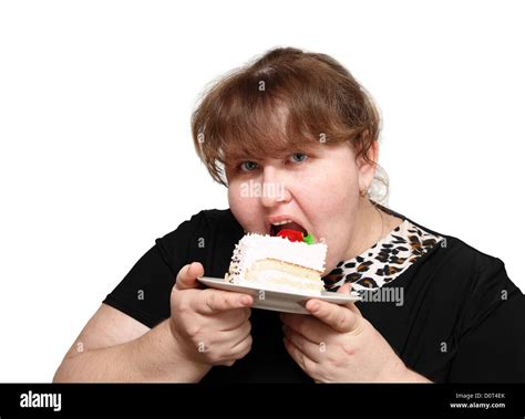 Overweight Woman Biting Cake Stock Photo Alamy