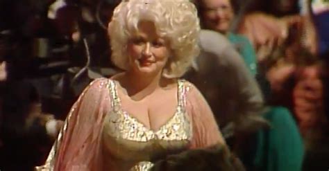 dolly parton was literally busting out of her dress at the cma awards rare country