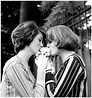 Catherine Deneuve And Françoise Dorléac kissing a pup, 1960 : OldSchoolCool