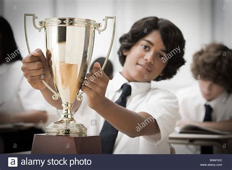 Boy with trophy Stock Photo - Alamy