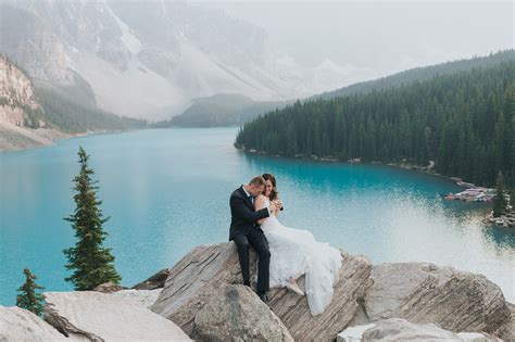 Moraine Lake Lodge Wedding Photos With Canoes And Mountain Views