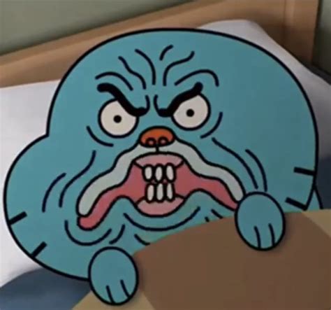 An Angry Cartoon Character Sitting On Top Of A Bed Next To A Box With