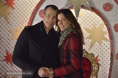 finding christmas promo shot of tricia helfer and mark lutz