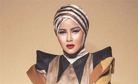 Olla Ramlan Wears Fendi Fall Winter 2019 Collection With Hijab