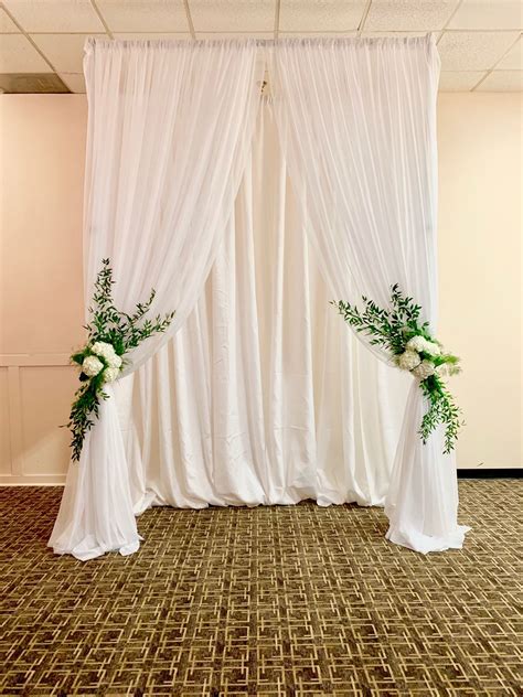 The Beautiful Archdrapery With Flowers Designed By Perfect Affair For