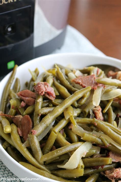 Add the collard greens to a slow cooker with the onion, ham hocks, brown sugar, pepper, salt, apple cider vinegar, and chicken broth. Slow Cooker Green Beans with Ham | Pocket Change Gourmet