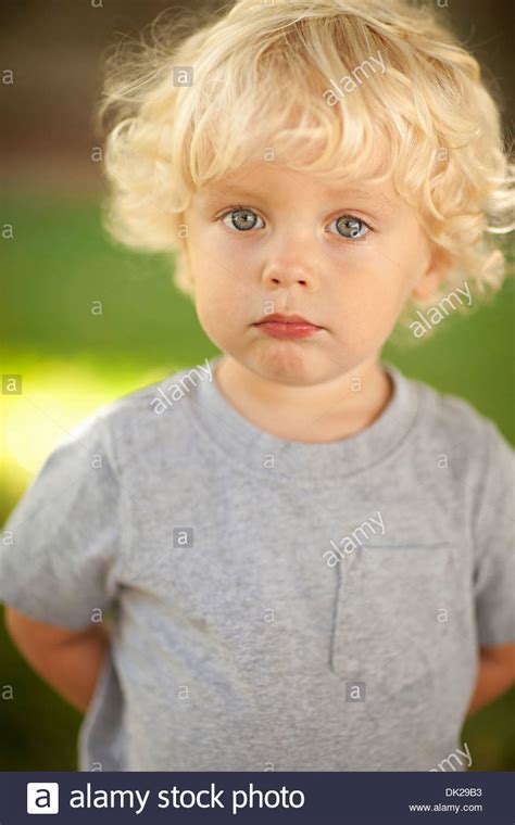 Close Up Portrait Of Innocent Blonde Toddler Boy With
