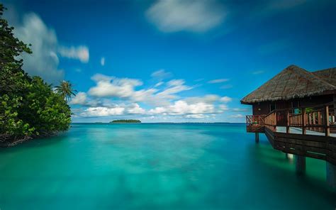 nature landscape bungalow sea clouds walkway beach maldives tropical trees summer turquoise