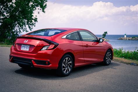 The feature list of civic includes immobilizer, central locking, power door locks and anti theft device in terms of security. Review: 2016 Honda Civic Coupe LX | Canadian Auto Review