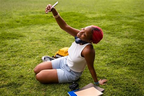 Premium Photo Portrait Of Braless Woman Outdoors Taking Selfie