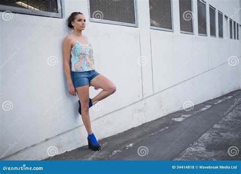 Attractive Woman Leaning Against A Wall Stock Photo Image Of View Fashiona