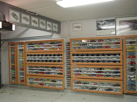 Display Cabinets In The Garage Show Off The Little Cars Along With The