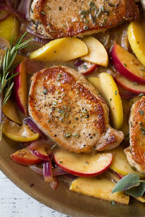 Baked thin pork chops make this sheet pan dinner quick and tasty! Pork Chops with Apples and Onions - Cooking Classy