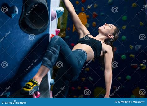 Muscle Female Woman Climbing Bouldering In Training Hall Stock Photo