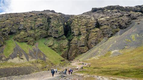 Tourists Exploring Rauofeldsgja Ravine Gorge In Snaefellsbaer Iceland