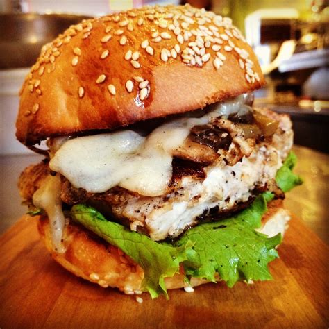 Chargrilled Gourmet Chicken Burger With Swiss Cheese Mushrooms And