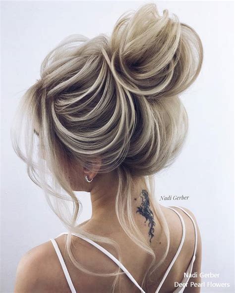 Pair with your favorite dangly earrings and you've got a stunner. Top 20 High Bun Wedding Updo Hairstyles | Deer Pearl Flowers