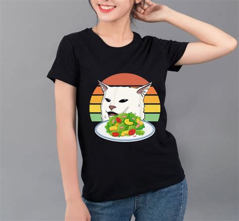 Top Angry Woman Yelling At Confused Cat At Dinner Table Meme Shirt