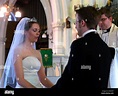 Briede & Groom Exchanging Vows During an Anglican Wedding Service ...