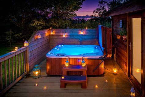 Pin By Elizabeth Welsch On Dream Board Hot Tub Landscaping Lodges With Hot Tubs Hot Tub Lights