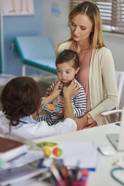 Mother And Daughter Visit A Doctor Stock Image Everypixel