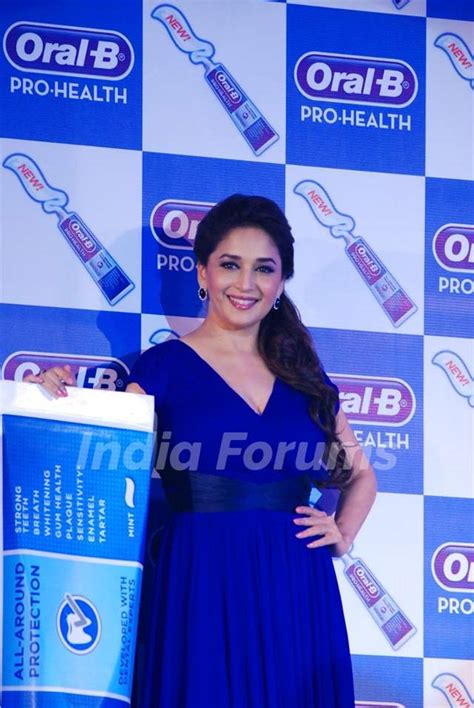 madhuri dixit nene during the launch of pro health toothpaste oral b s biggest