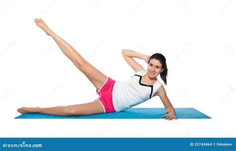 Beautiful Young Female Exercising On A Blue Matt Stock Photo Image Of