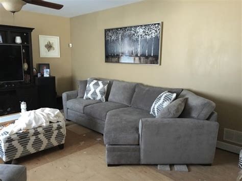 Livening up the tone of any room, shades of red can be surprisingly versatile. Wall Colors with gray couch??