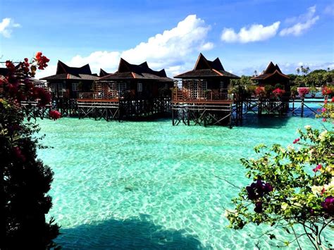 A medium sized resort, the sipadan water village resort features a total of 45 rooms, each of which are situated above the water, making this a truly over the water resort. Mabul Water Bungalows | Bungalow, Resort