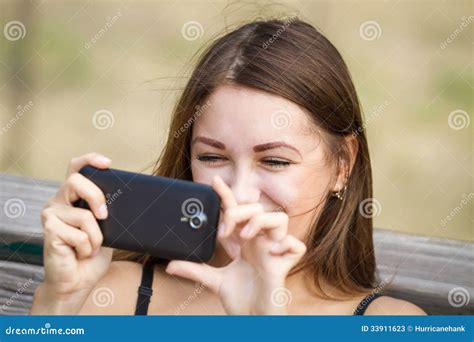 Happy Girl Taking Photo With Her Mobile Phone Stock Image Image Of