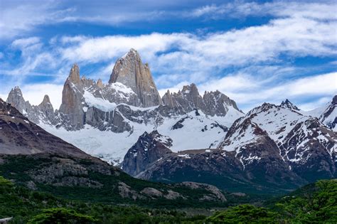 Browse Free Hd Images Of Jagged Mountain Peaks Above Lush Forest Below