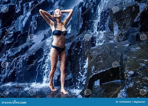 Girl In Black Swimsuit At Amazing Waterfall India Wildernest Dudhsagar