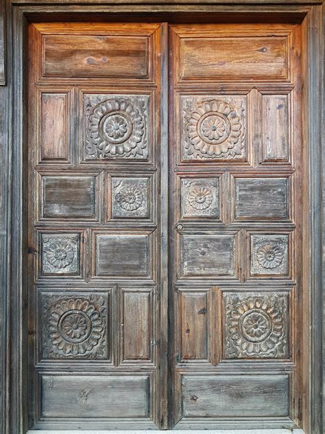 9 Breathtaking Wood Carving Door Designs For Indian Homes