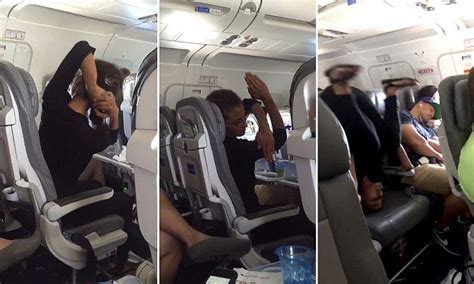 Female Passenger On Flight From La To San Lucas Does Yoga Upside Down
