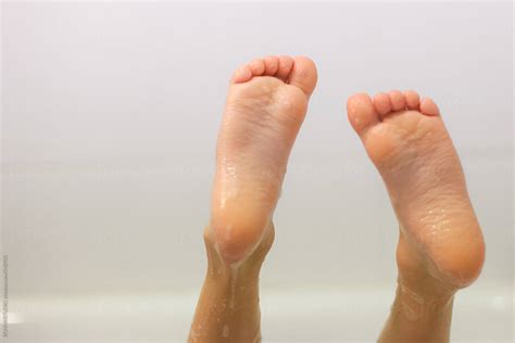 Young Boy Feets In A Bathtub By Stocksy Contributor Bonninstudio