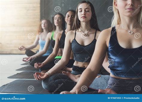 Young Women In Yoga Class Relax Meditation Pose Stock Image Image Of