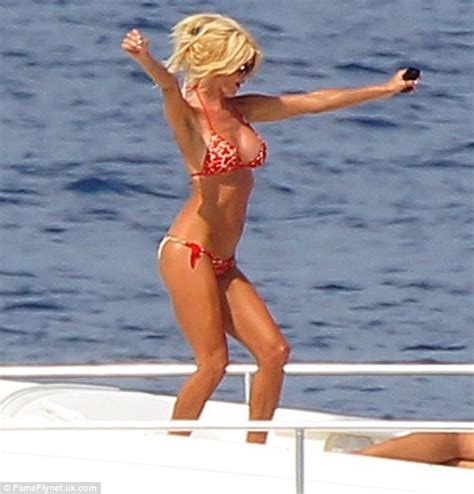 victoria silvstedt shows off her bikini body as well as her dance moves during yacht trip