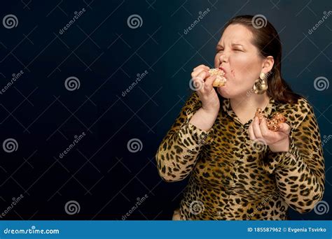 Fat Girl Eating Fast Food With An Appetite In The Hand A Bitten Donut Leopard Blouse Dark