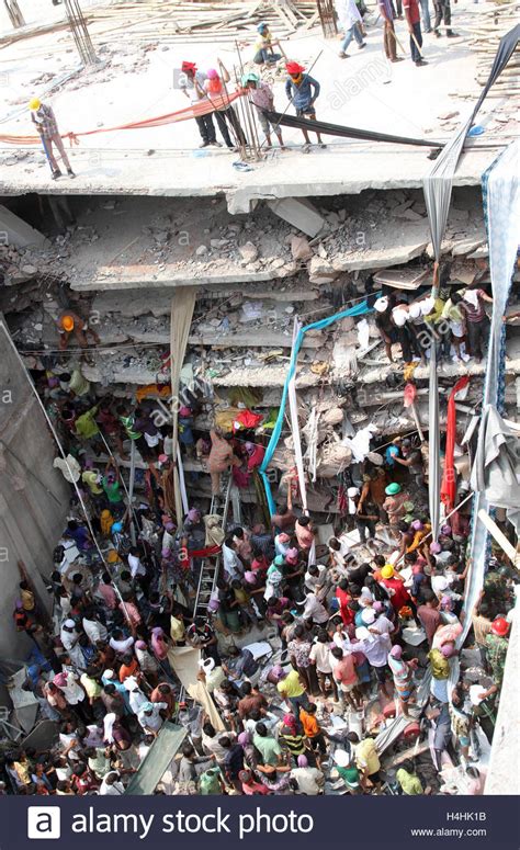 Bangladeshi People Gather As Rescuers Look For Survivors And Victims At The Site Of Rana Plaza