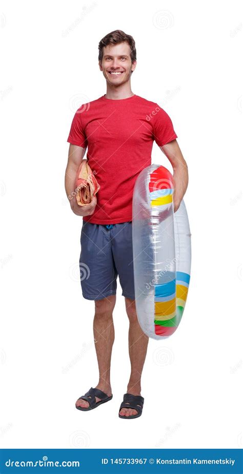 Front View Of A Man In Shorts With An Inflatable Circle Stock Image Image Of Enjoying Beach