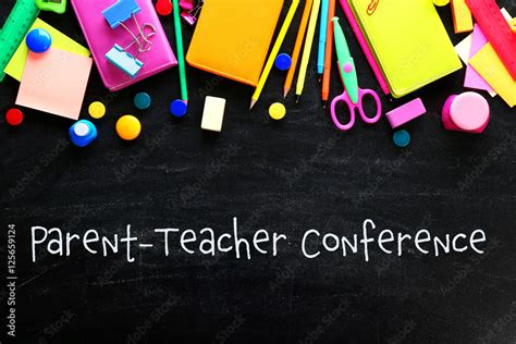 Text PARENT TEACHER CONFERENCE With Stationary On Blackboard Background