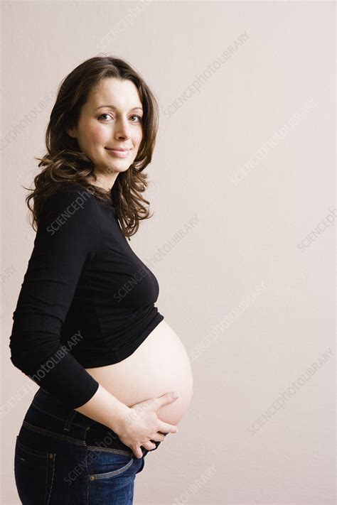 Pregnant Woman Holding Her Belly Stock Image F003 2189 Science Photo Library