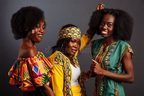 Three Young Beautiful African Fashion Models Have Fun And Laughing In