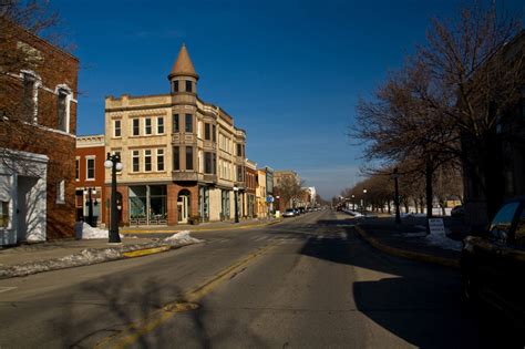 Menominee Mi A View Northward Up Historic 1st St During Winter With