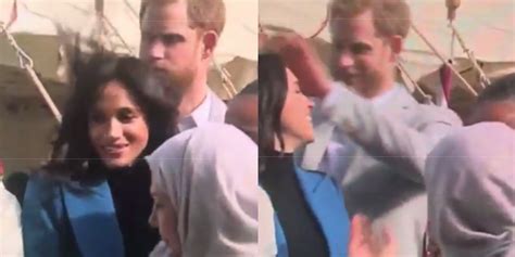 Prince Harry Fixes Meghan Markles Hair Video Prince Harry Caught