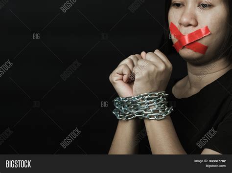 Asian Girl Hands Tied Over Head Telegraph