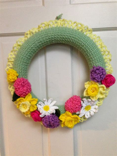 spring wreath with yellow ruffle yarn wreath wreath crafts diy wreath wreaths crochet wreath