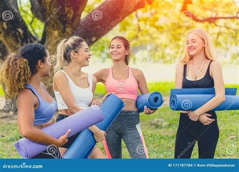 Group Of Healthy Girl With Yoga Mat Enjoy Talking Together Relax Scene